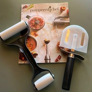 Pampered Chef Pizza cutter and dough roller.